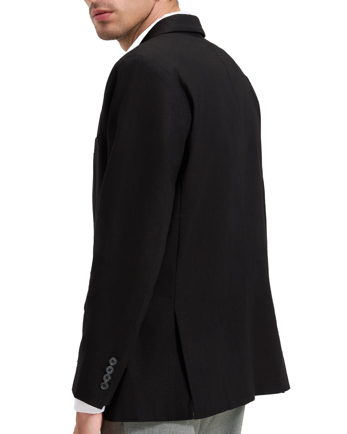 Side and back view of the black linen blazer worn over a white shirt