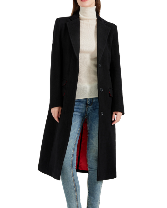 Model holding the covert overcoat open to reveal the red satin lining