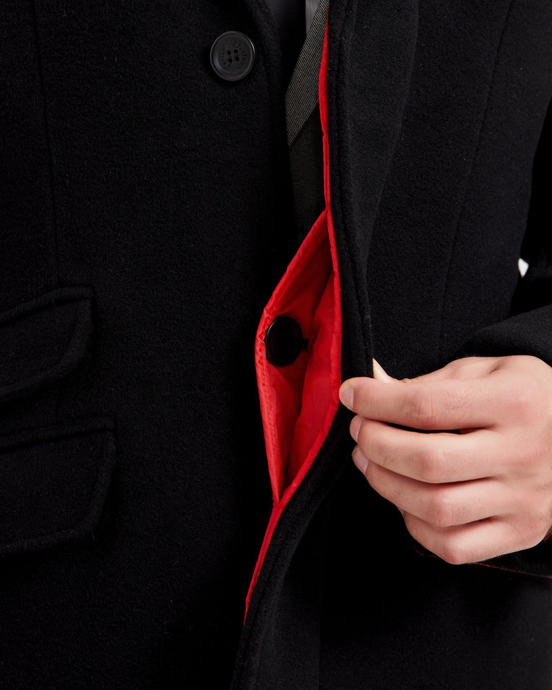 Black wool cashmere covert overcoat back view velvet collar — The Platinum Tailor